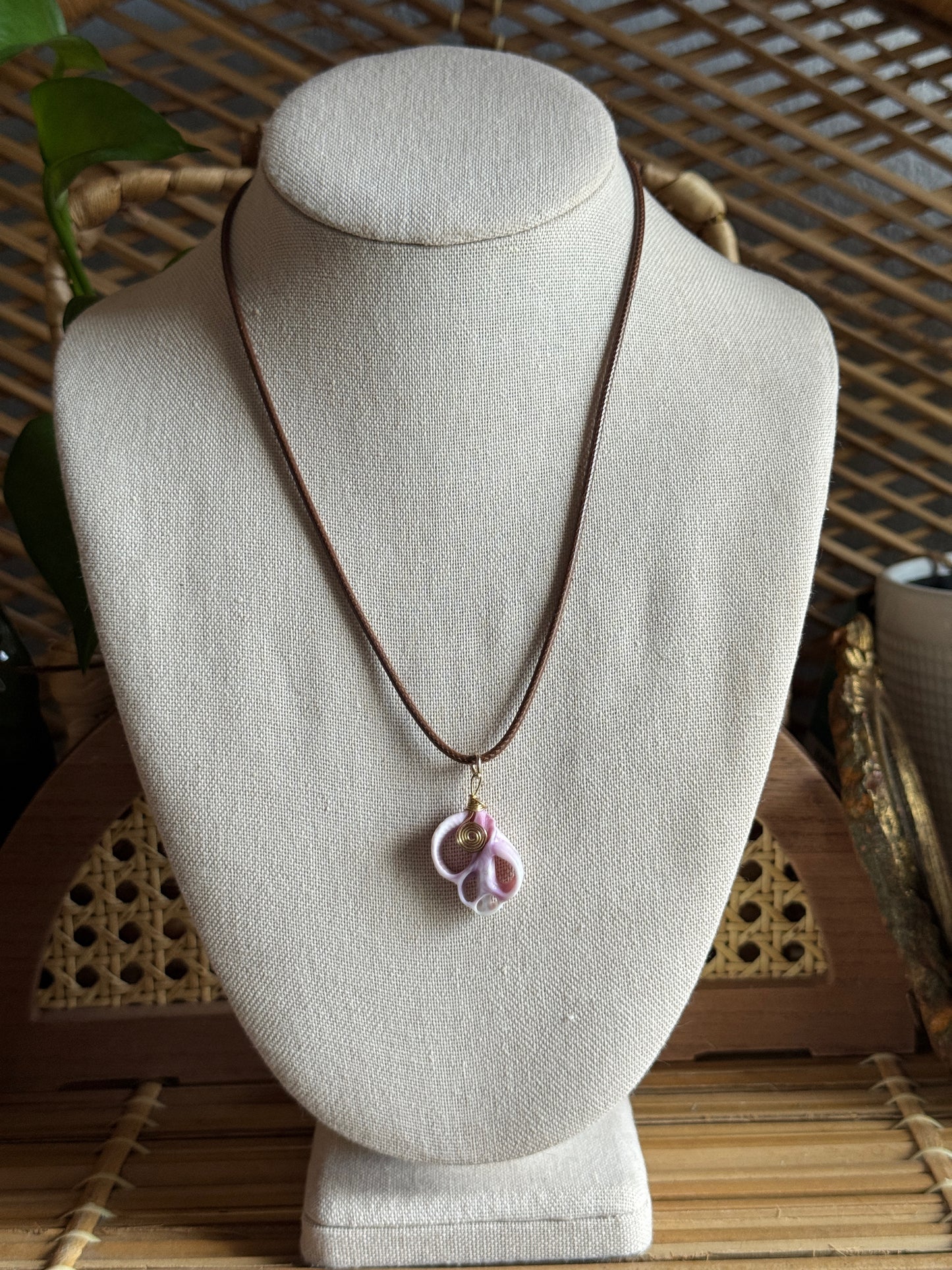 purple shell cord necklace