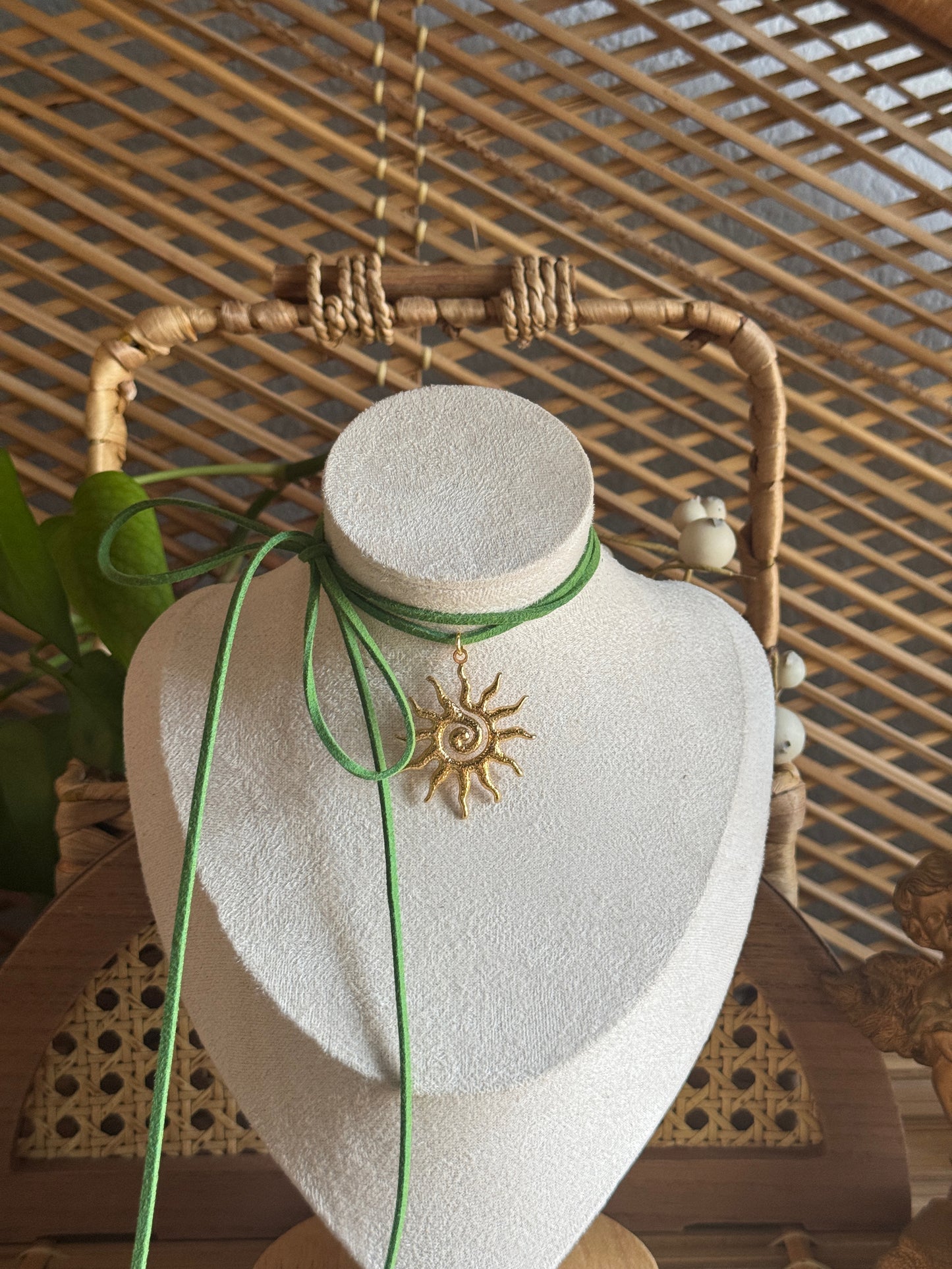 gold swirl sundial green suede necklace