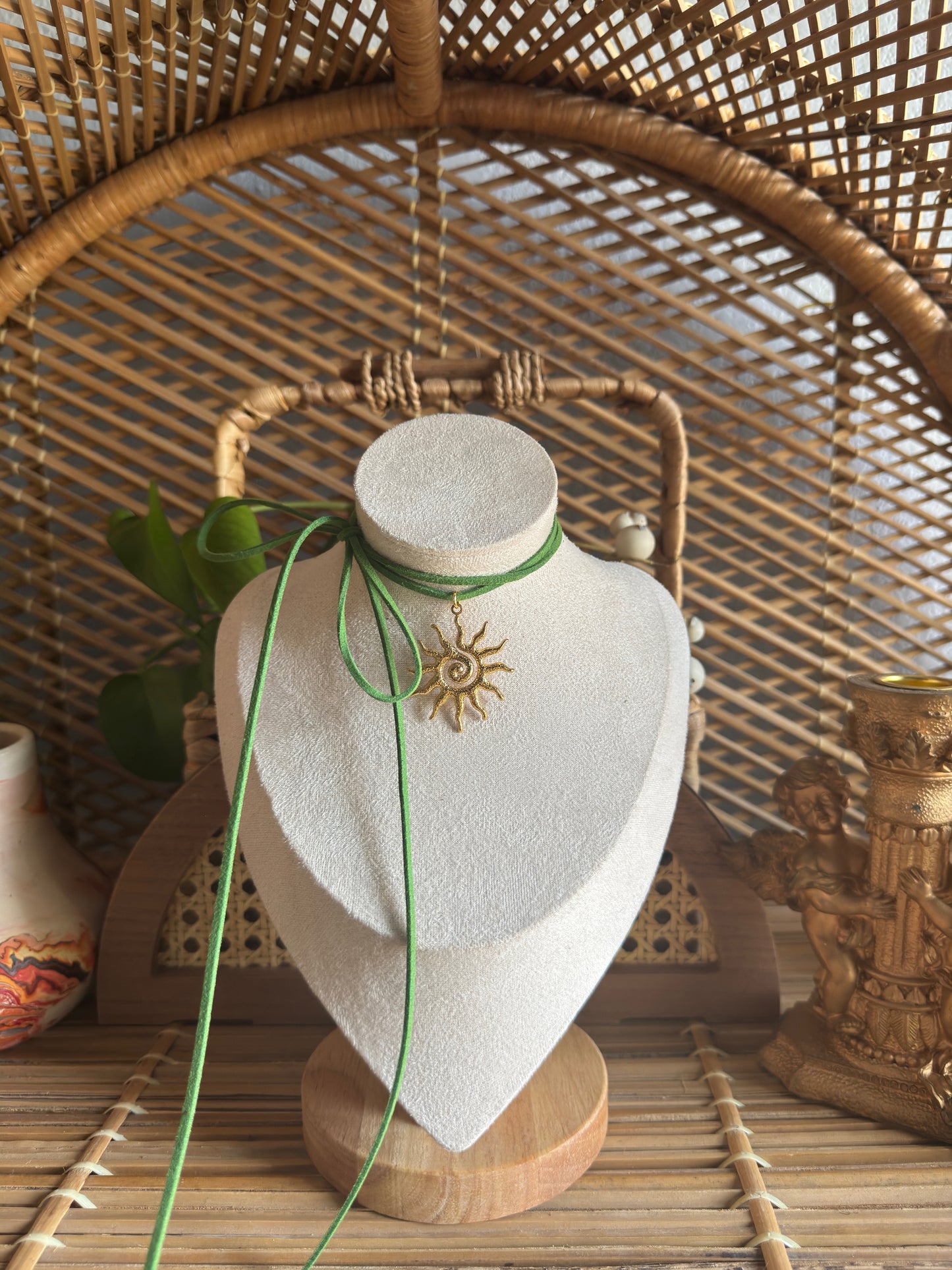 gold swirl sundial green suede necklace