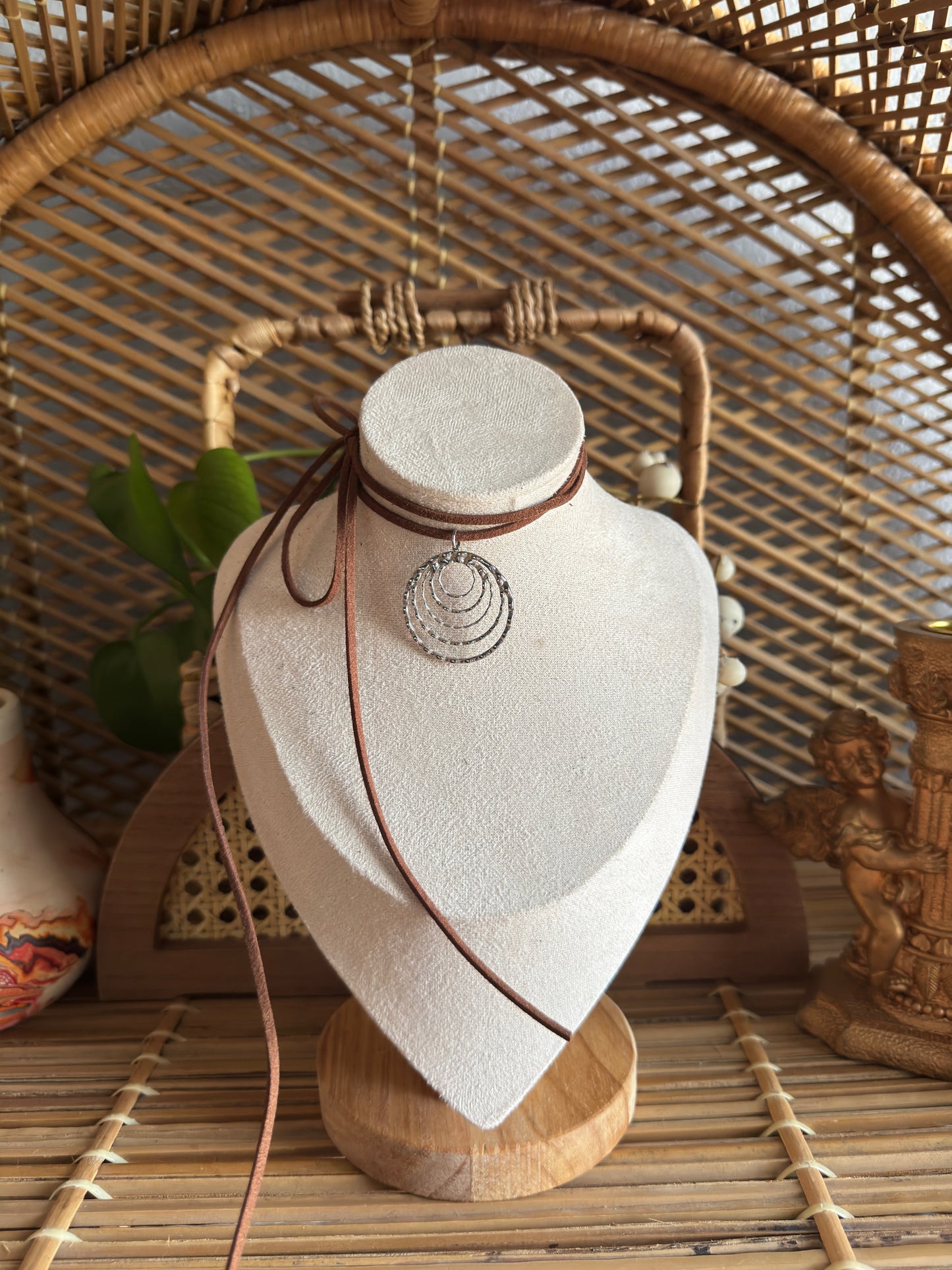 stainless steel textured swirl brown suede necklace