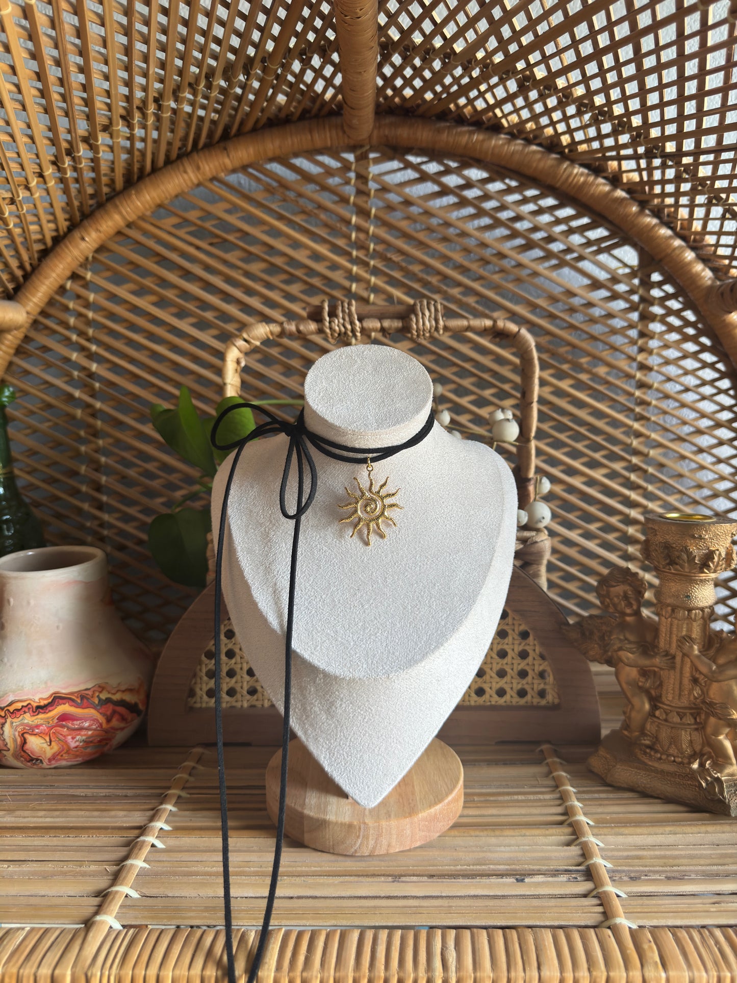 gold swirl sundial black suede necklace