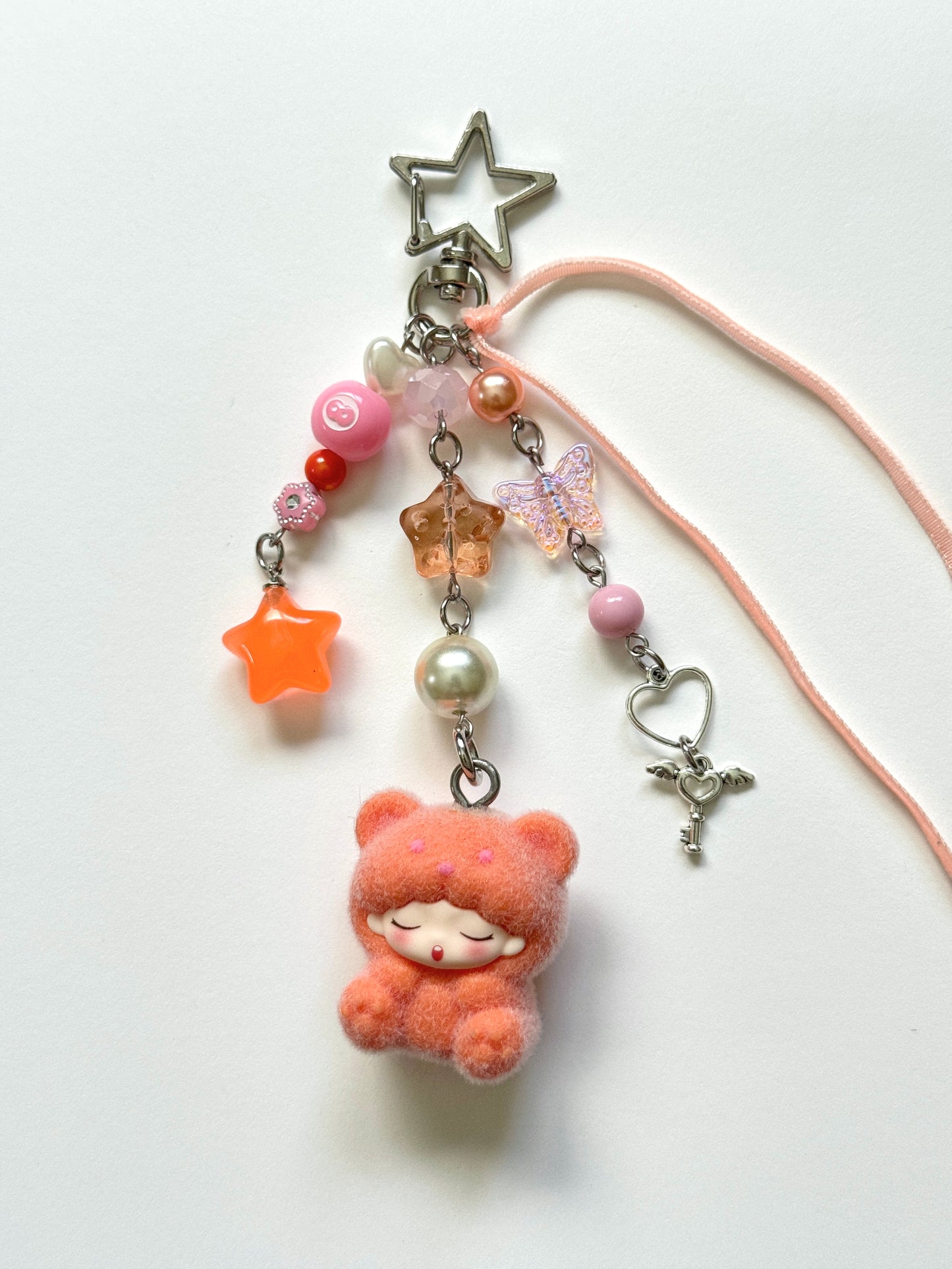 orange sleepy bear keychain