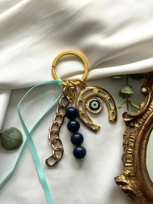 evil eye horseshoe bag charm