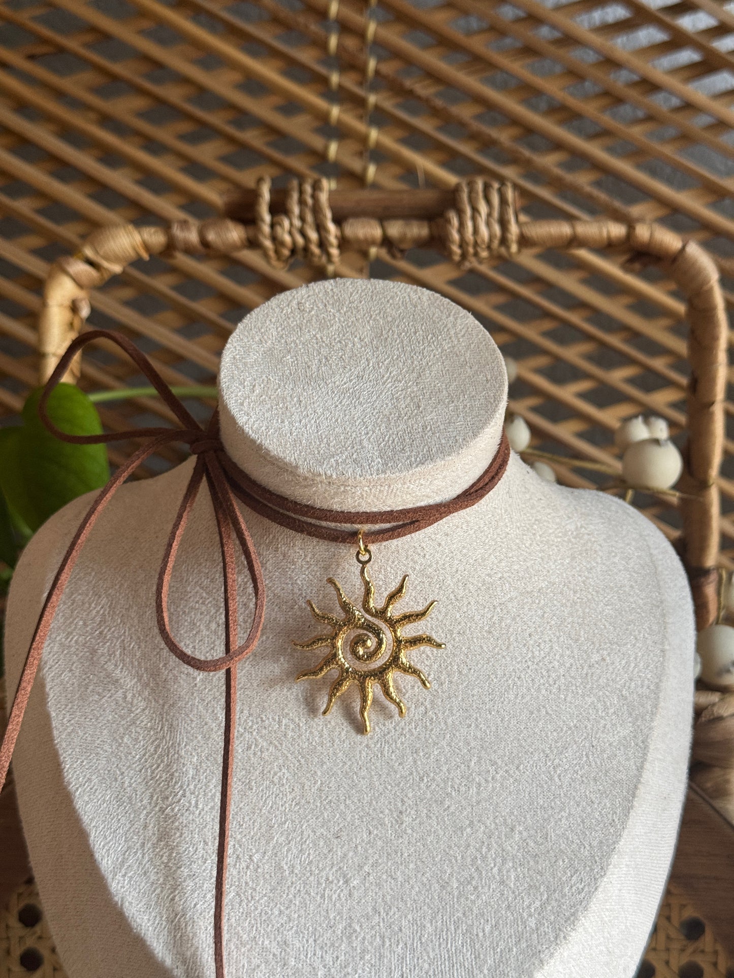 gold swirl sundial brown suede necklace