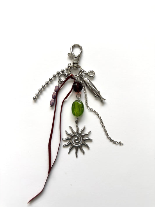 sun talisman keychain- green