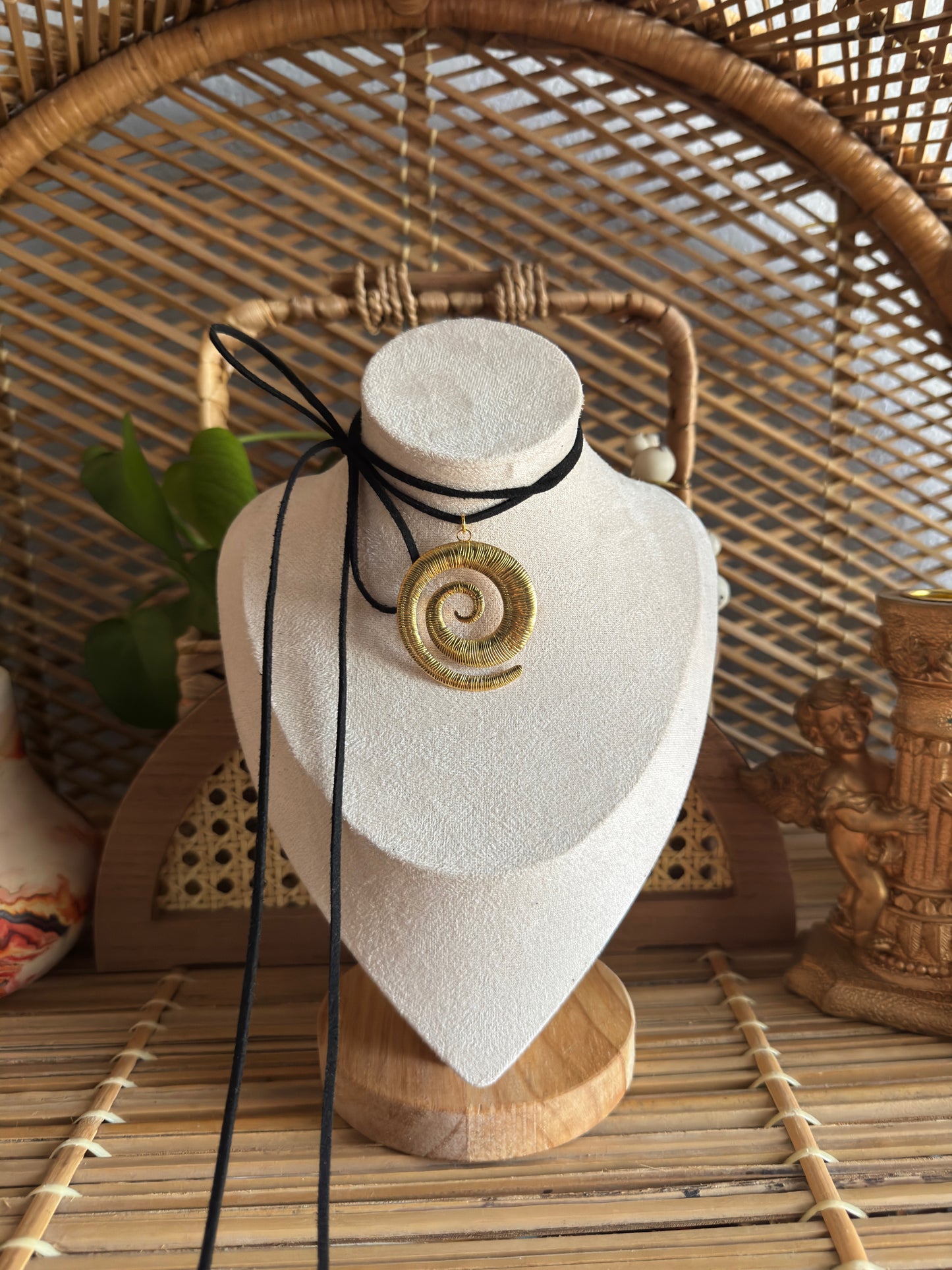large gold swirl black suede necklace