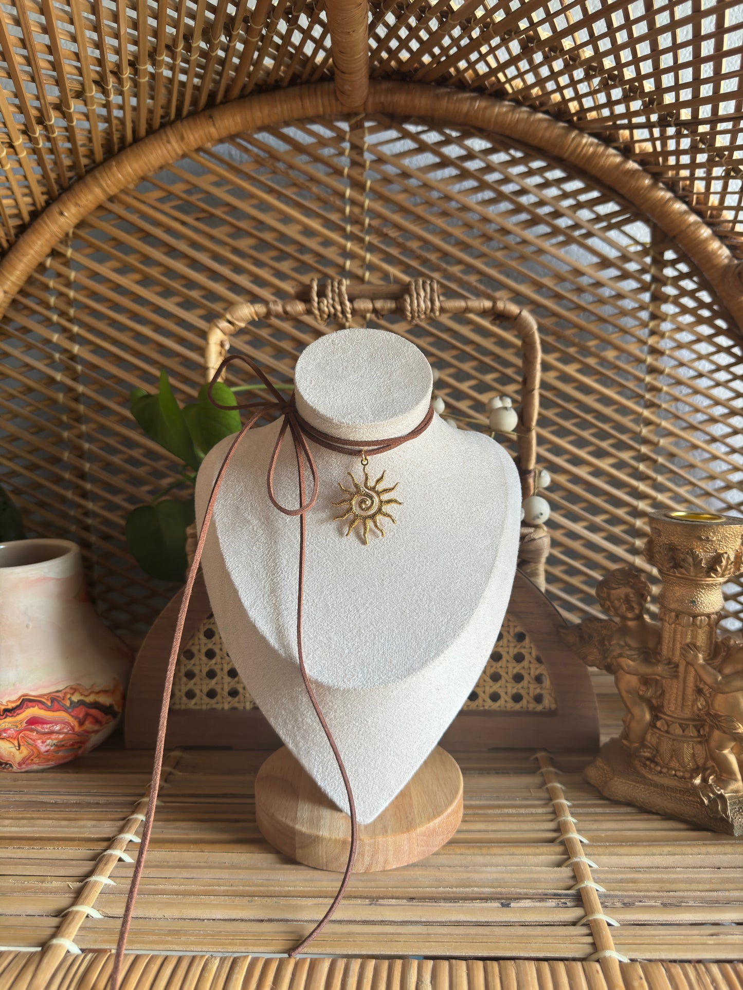 gold swirl sundial brown suede necklace