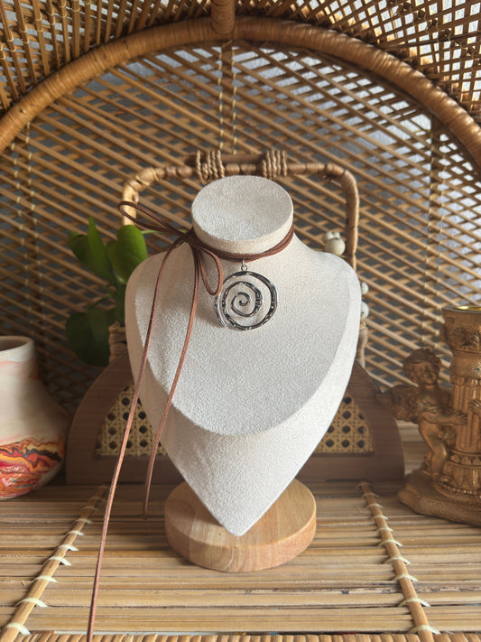 large swirl stainless steel brown suede necklace