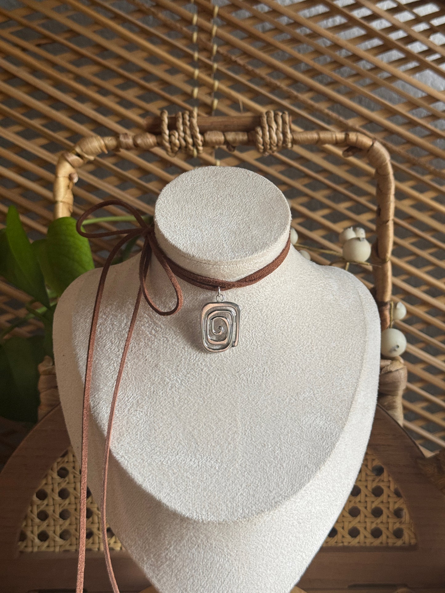 irregular stainless steel swirl brown suede necklace