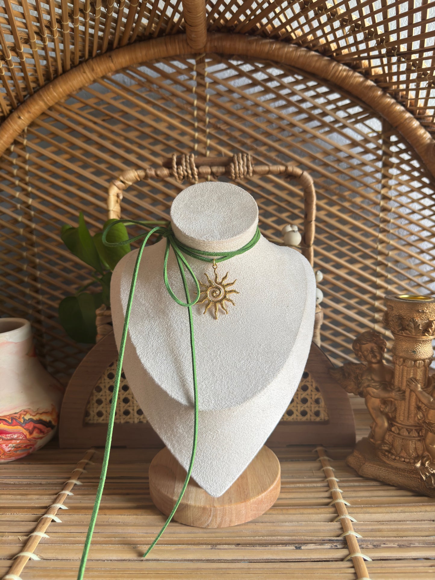 gold swirl sundial green suede necklace