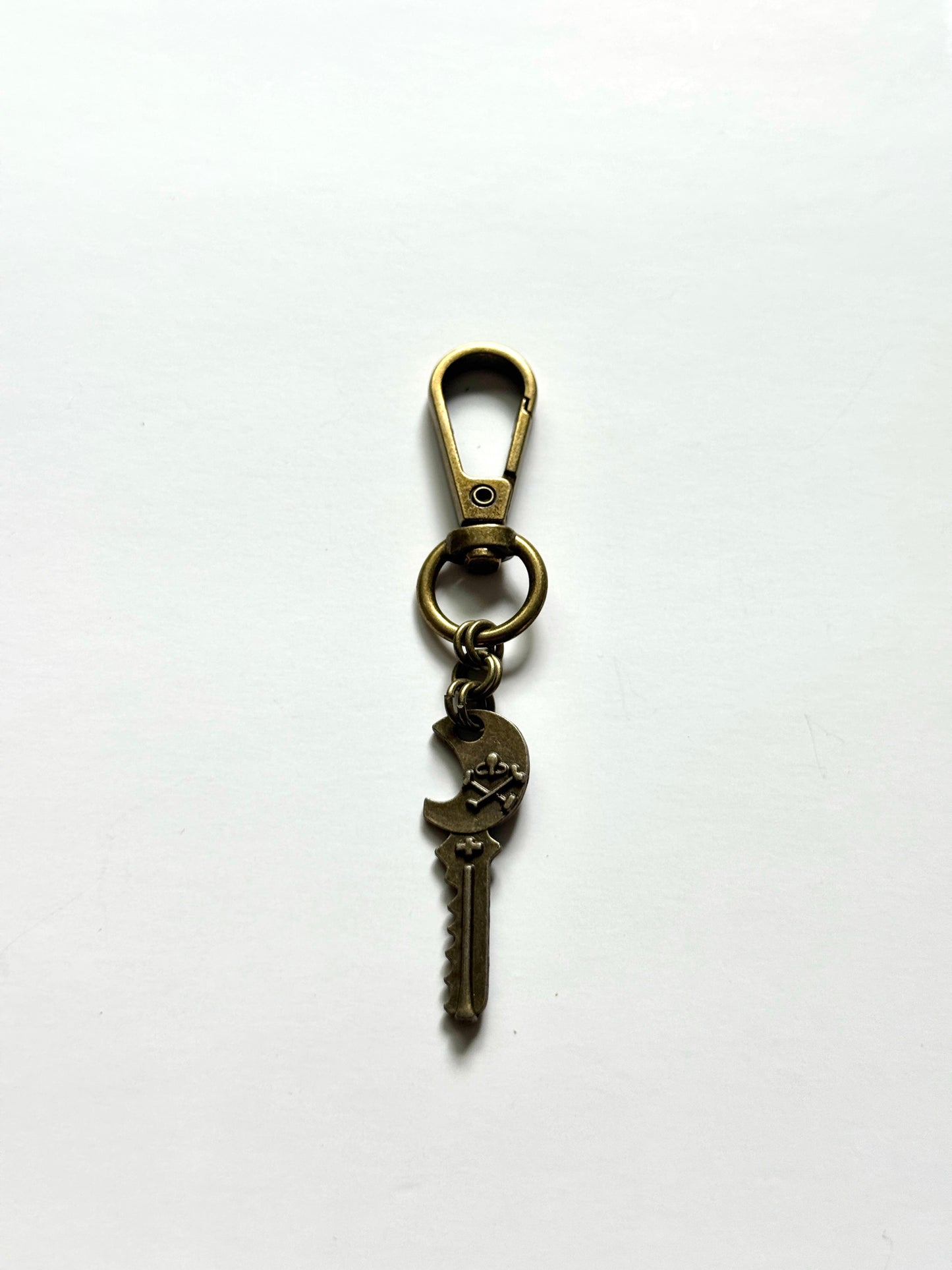 bronze skeleton key bag charm