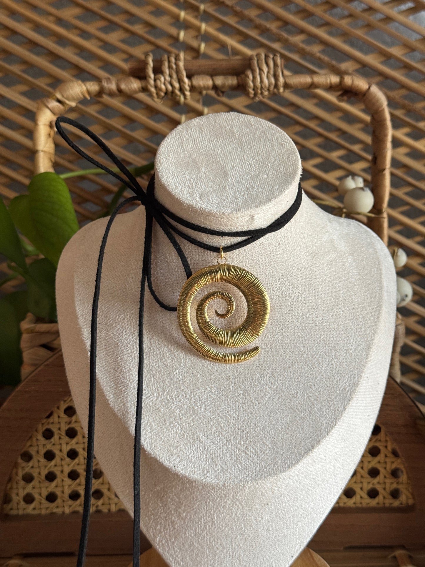 large gold swirl black suede necklace