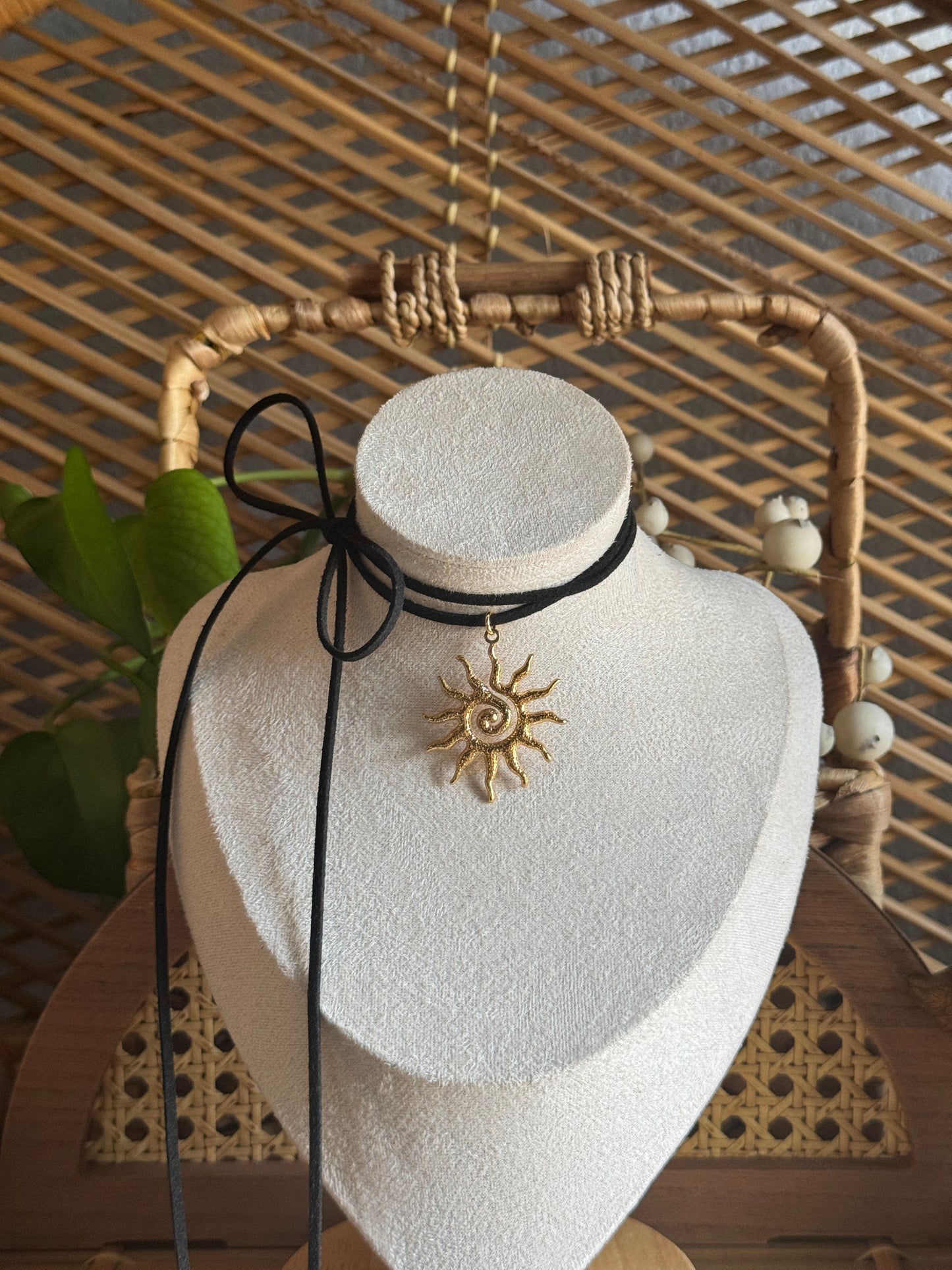 gold swirl sundial black suede necklace