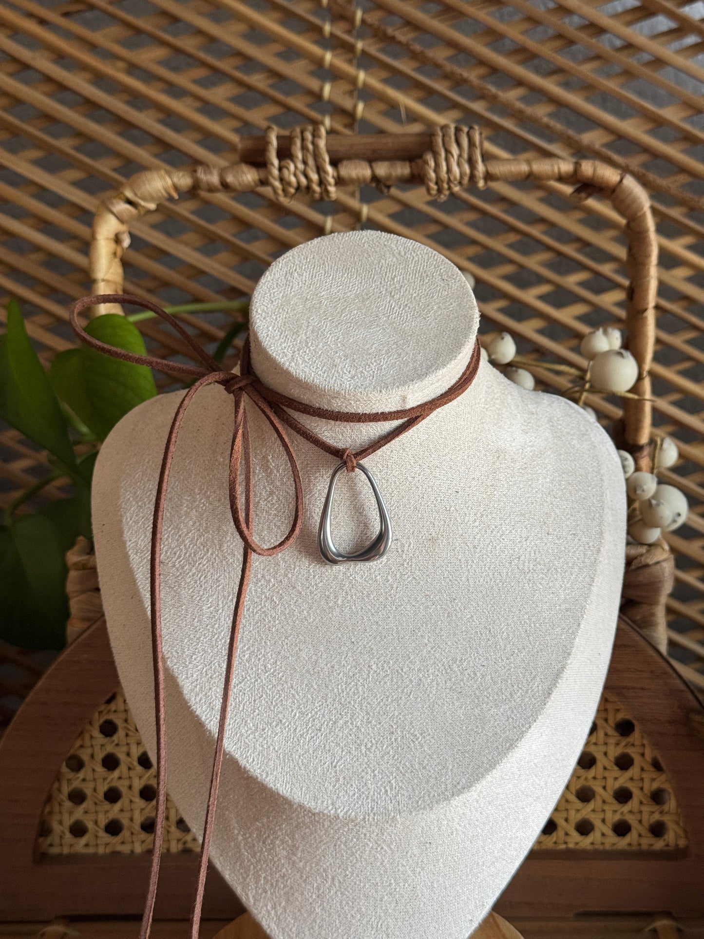 stainless steel pendant knot brown suede necklace