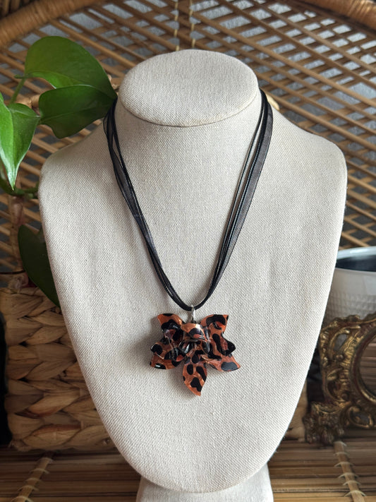 tortoise flower black ribbon cord necklace