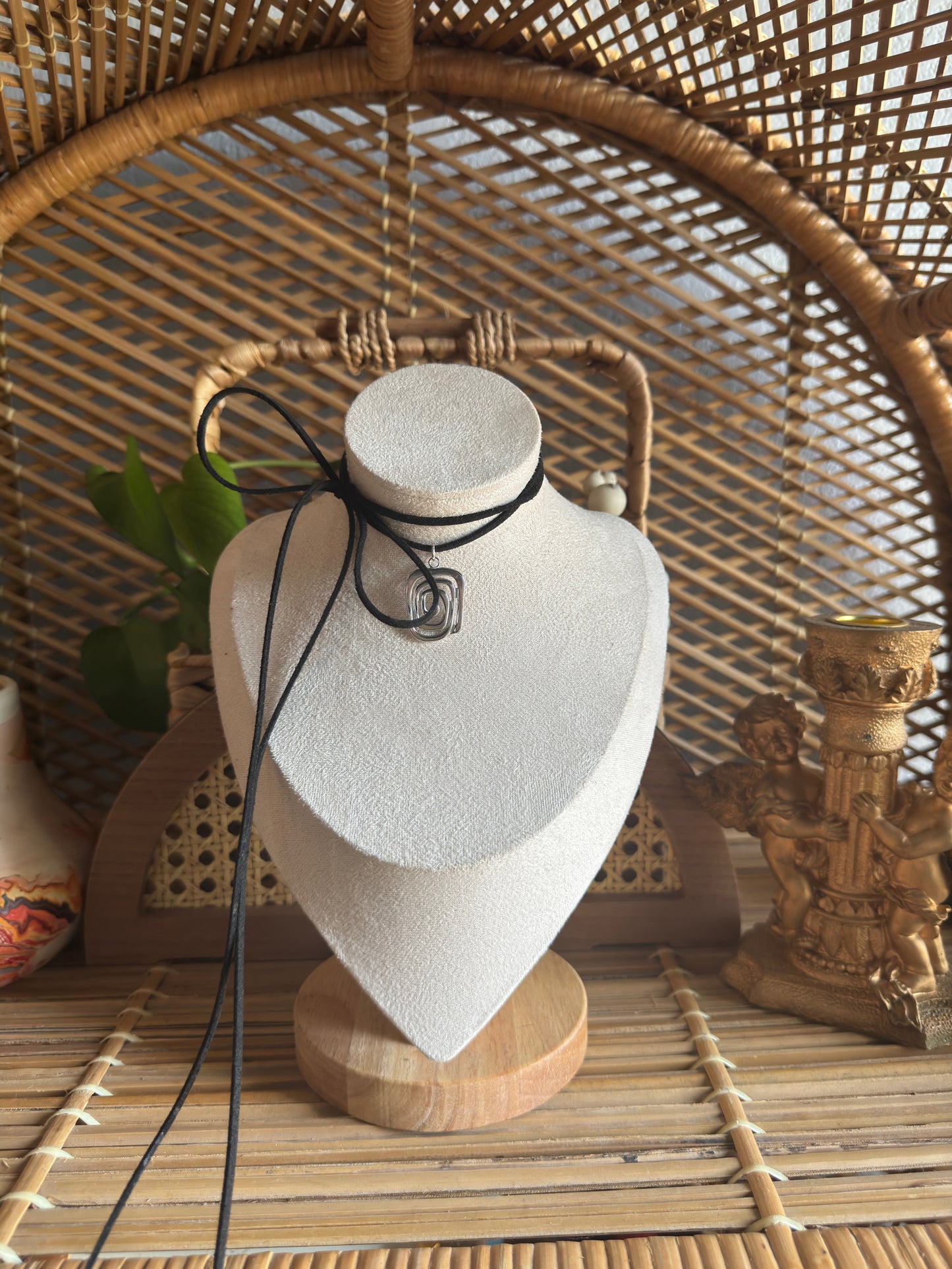 irregular stainless steel swirl black suede necklace