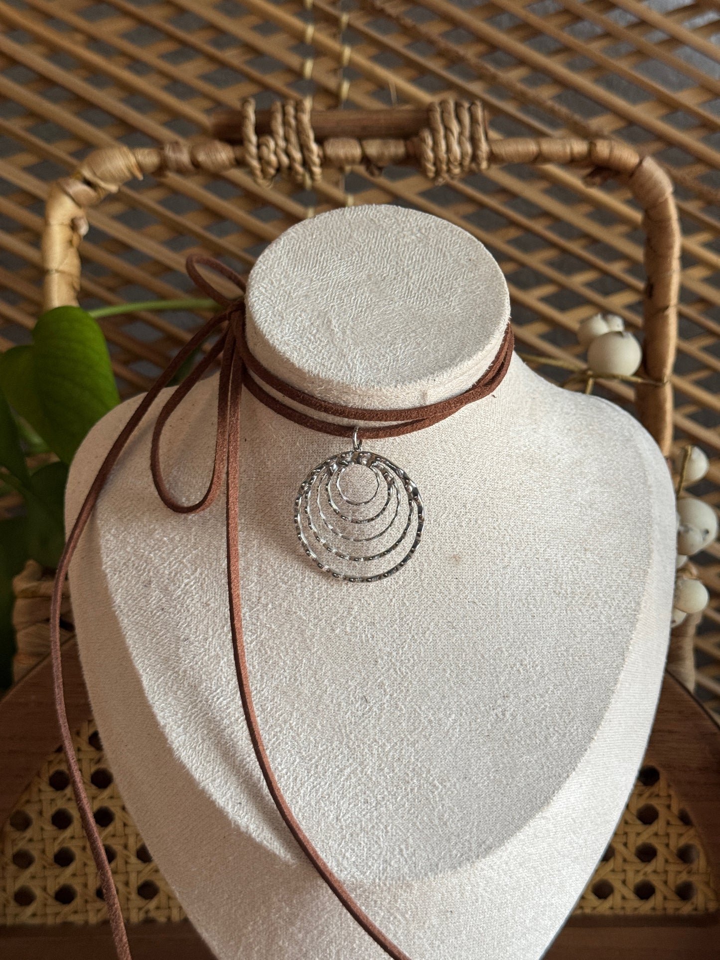 stainless steel textured swirl brown suede necklace