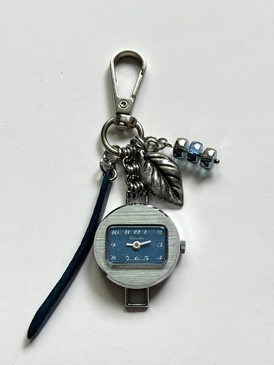 blue world watch bag charm
